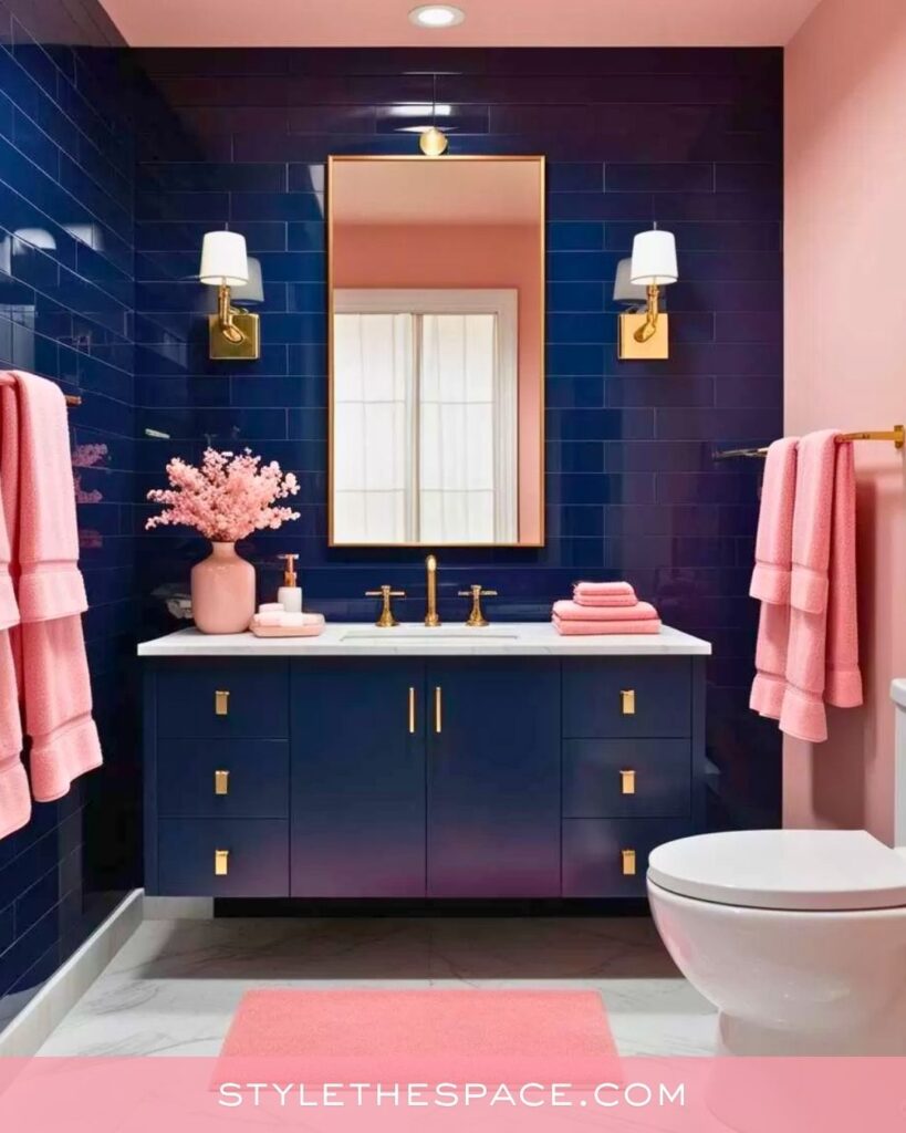 Bold Pink and Navy Bathroom With Gold Details