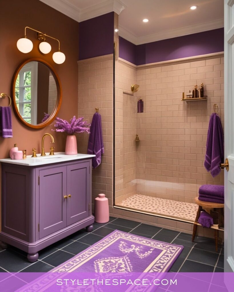 Warm Purple Bathroom With Soft Beige Tile and Gold Accents