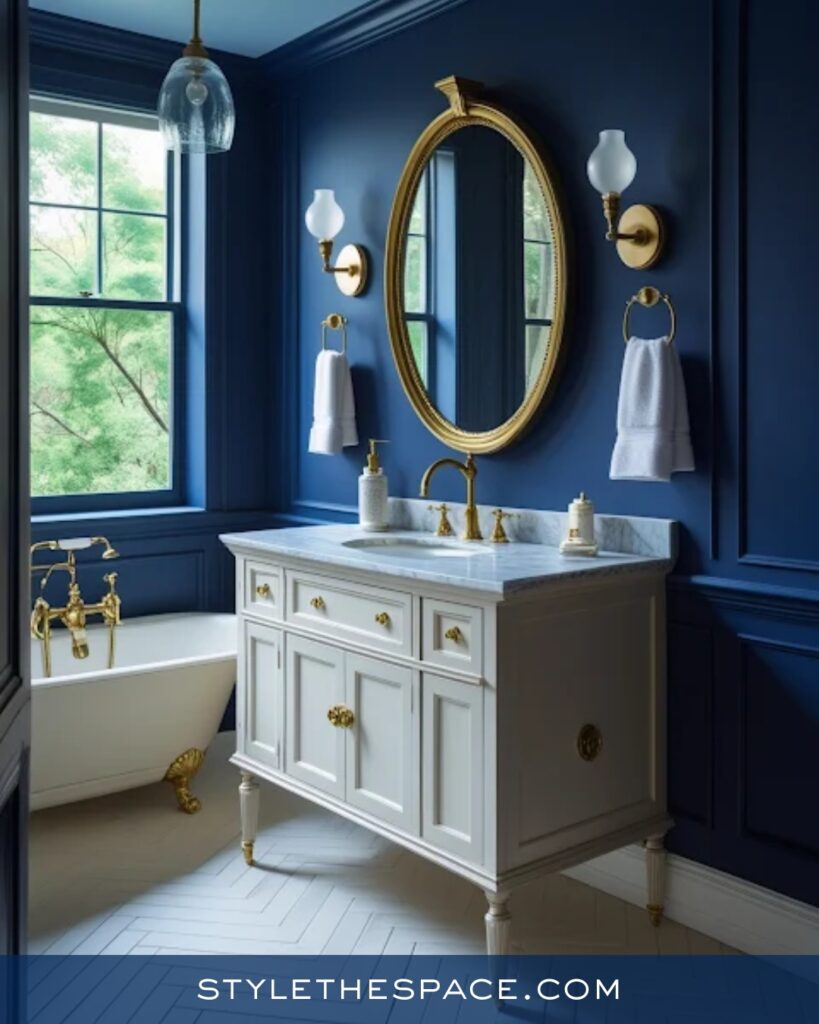 Navy Blue Bathroom With White Vanity and Brass Accents